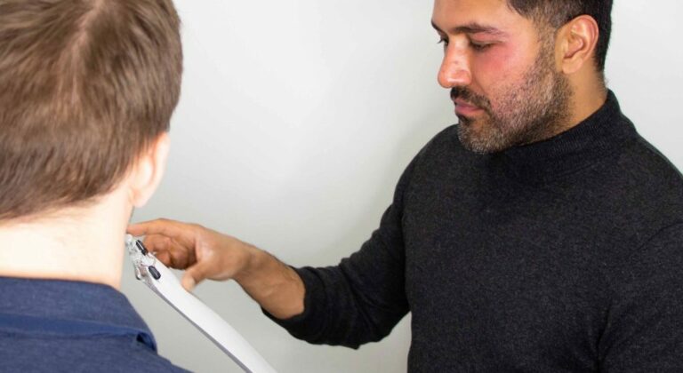 doctor sharma performing crown hair transplantation consultation 1024x1269