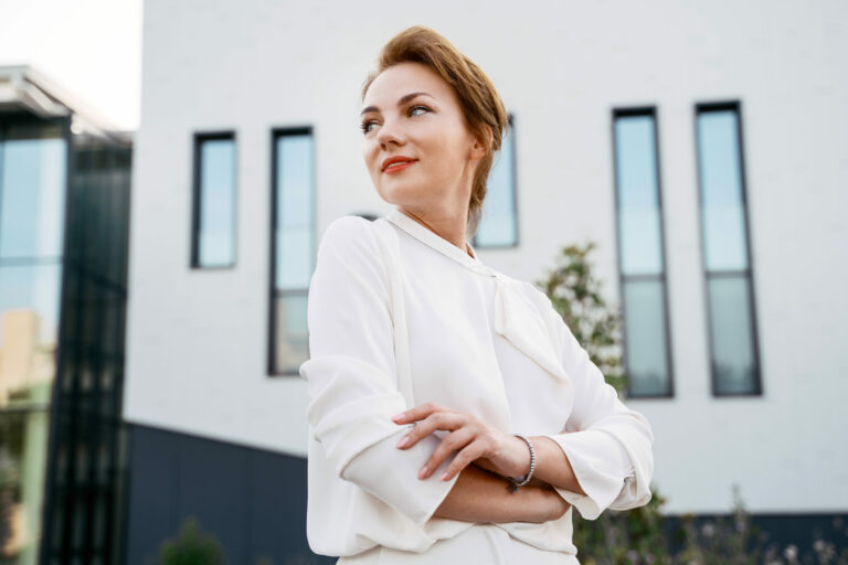 middle aged businesswoman with arms crossed lookin 2022 11 23 00 41 32 utc